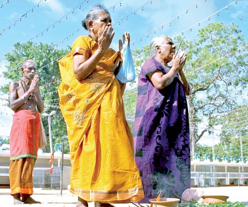 Pilgrims make their way to the Mahadevale