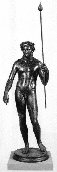 naked Dionysus of a juvenile type holding a tyrsos, the traditional attribute of the god.