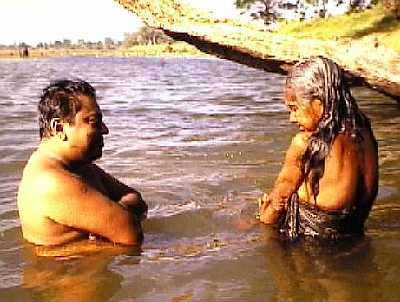 Manik dialogue with woman in tank